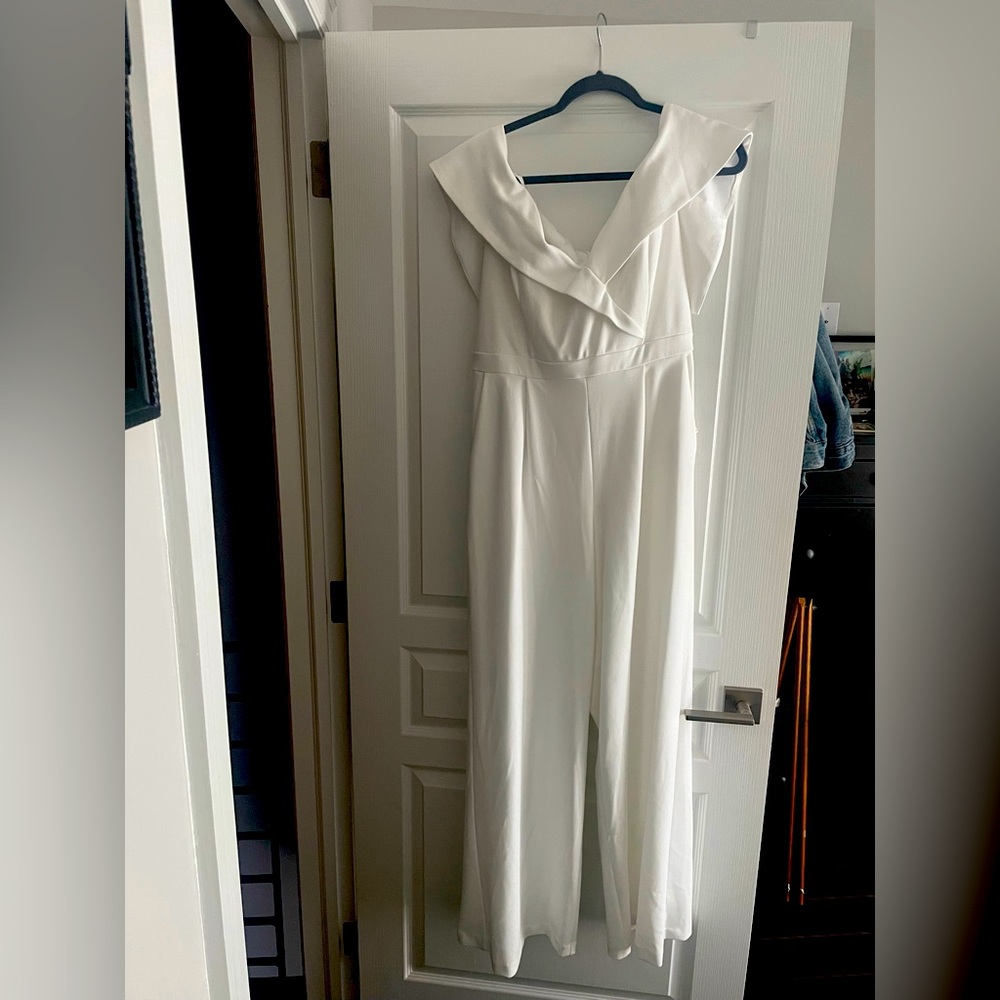 David’s Bridal white jumpsuit size 12. Worn once and dry cleaned.